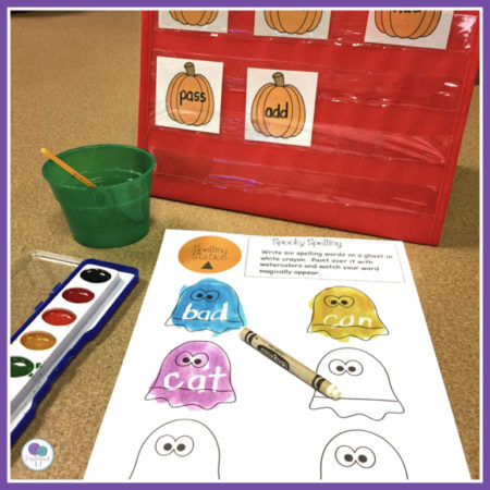 Halloween learning center activities for first grade kids. Your students will love this spooky spelling activity.  Kids write their words with white crayon and then paint over top and watch it magically appear!