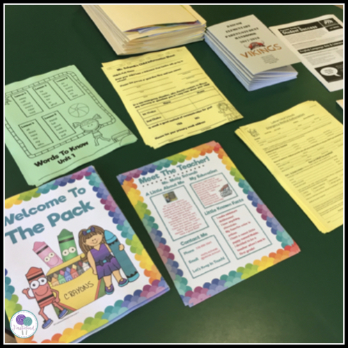 Meet the teacher night forms and lists on a table in classroom. 